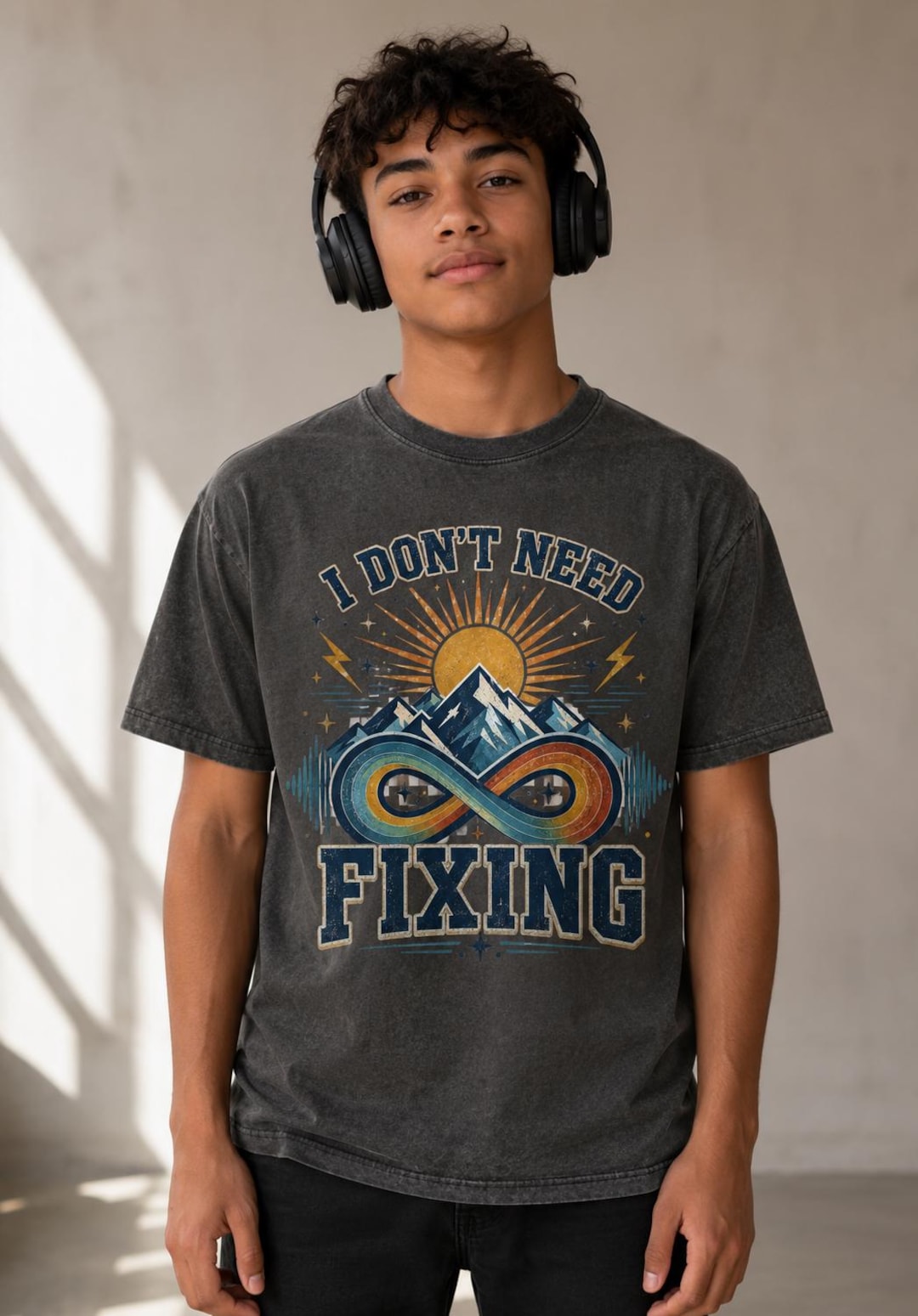 Model wearing the I Don’t Need Fixing Boys Autism Acceptance Shirt