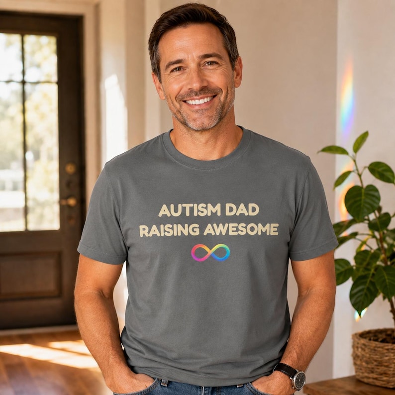 Model wearing the Autism Dad Raising Awesome Shirt