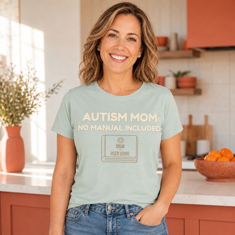 Model wearing the Autism Mom — No Manual Included Shirt